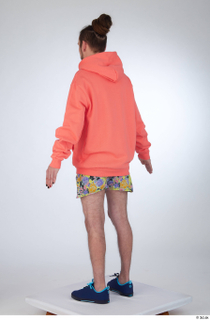 Nigel a-pose blue sneakers dressed floral printed shorts salmon hoodie…